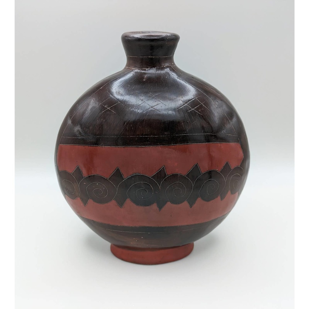 Central or South American painted etched brown pottery vase round disk shape